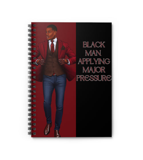 BLACK MAN APPLYING PRESSURE NOTEBOOK